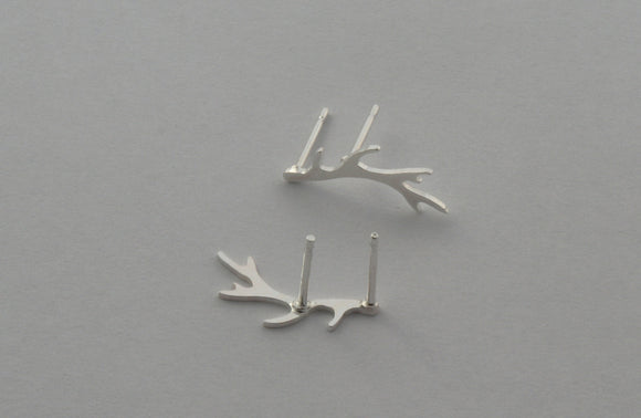 a pair of double post silver antler studs