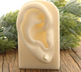 Tiny silver penguin feet stud earrings