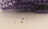 Tiny silver penguin feet stud earrings